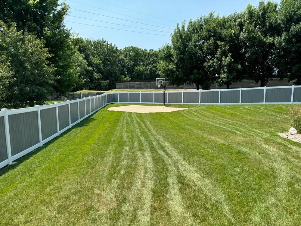 White vinyl privacy fence installed by Great Plains Fence in Sioux Falls, SD