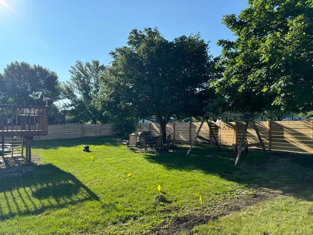 Backyard wood privacy fence installation by Great Plains Fence in Sioux Falls, SD